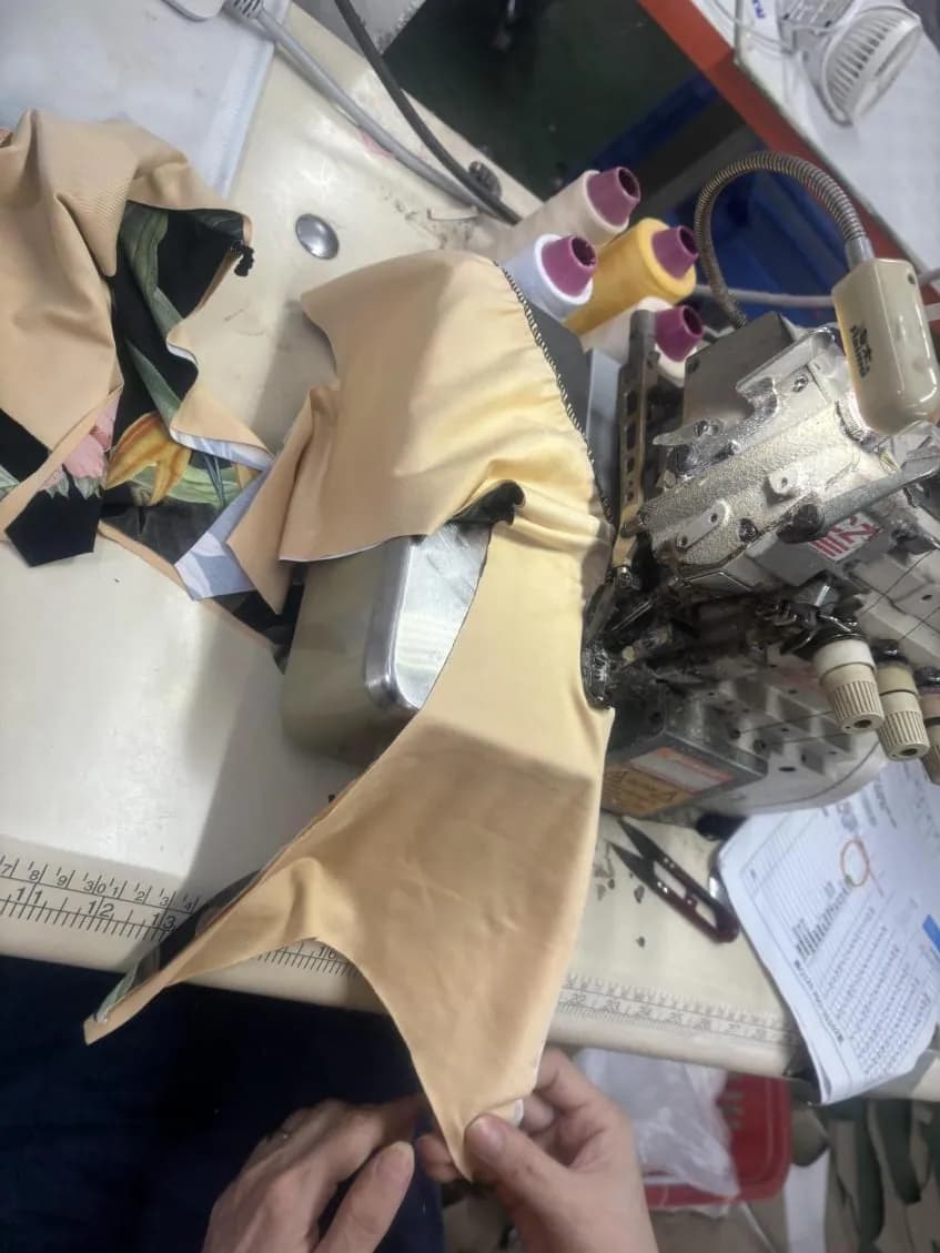 Pre-production swimwear sample sewn on the production line